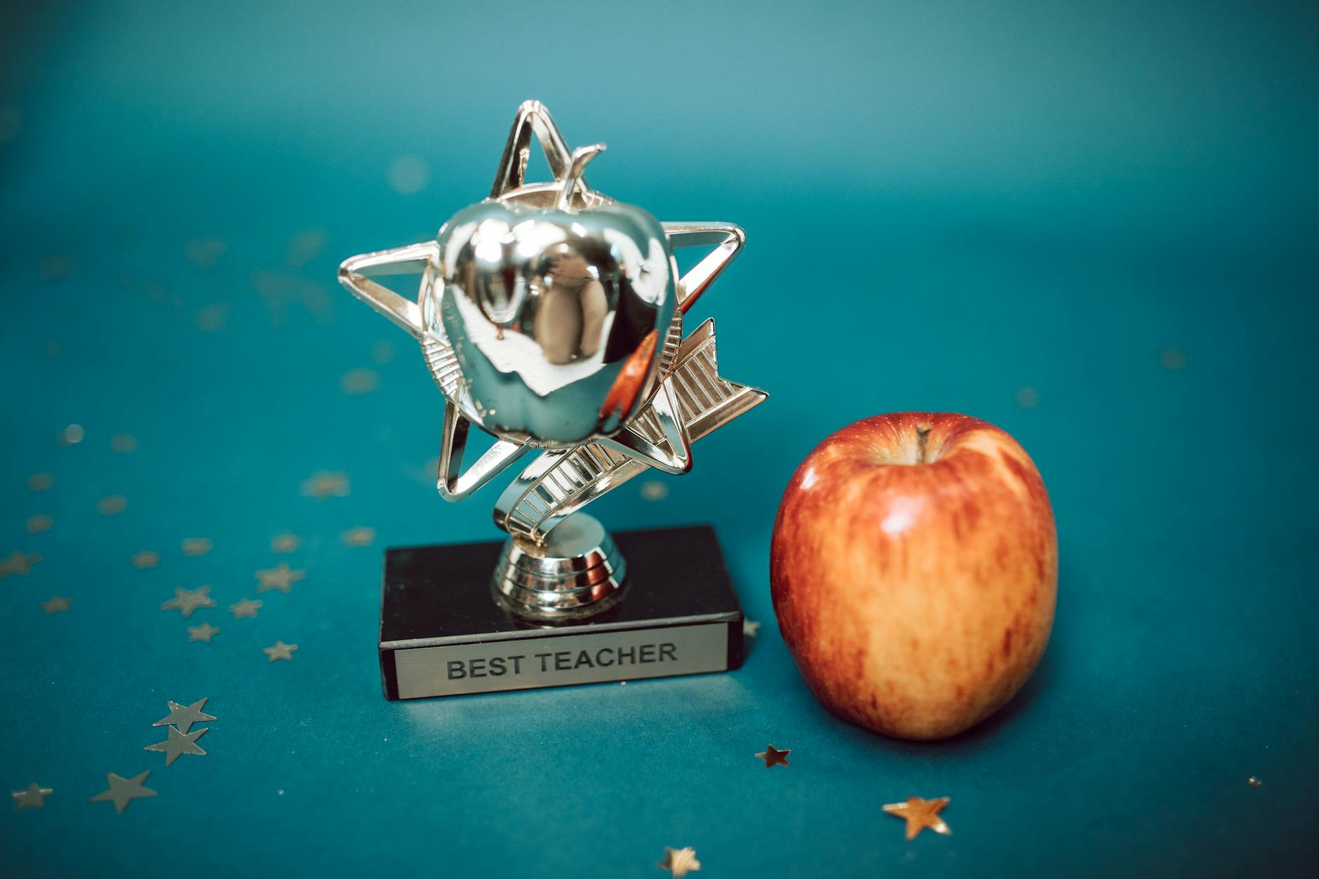 thoughtful teacher appreciation gifts under $20 arranged on a desk