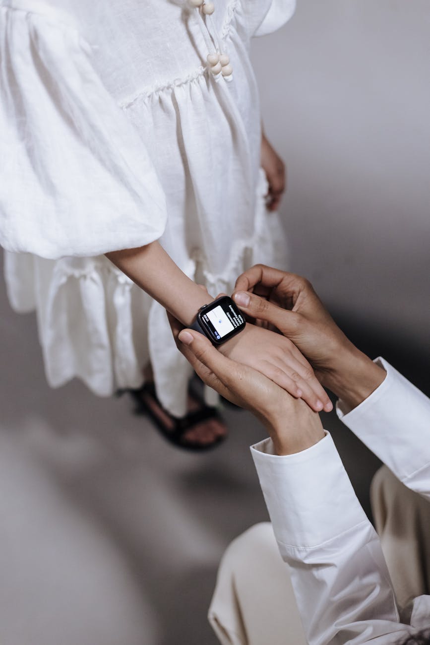 child wearing smartwatch outdoors
