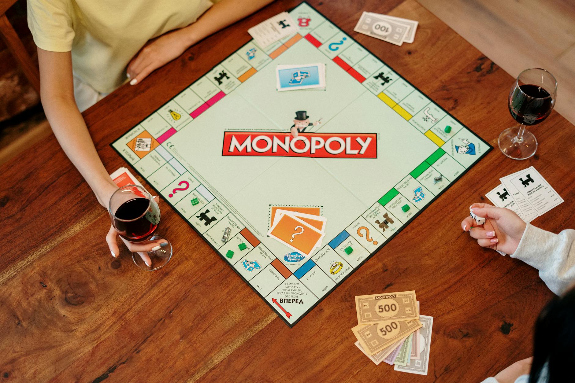 colorful board games spread on a table for kids under 10 at family game night